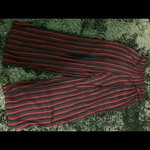 In good condition. Blue and red striped pants